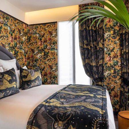 Hotel Ginette A La Folie & Spa Париж Екстериор снимка