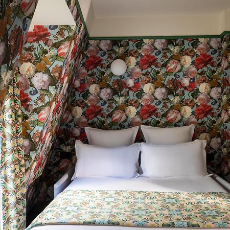 Hotel Ginette A La Folie & Spa Париж Екстериор снимка